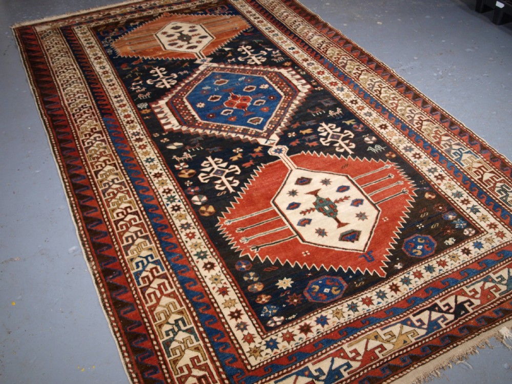 ANTIQUE CAUCASIAN SHIRVAN MEDALLION RUG OF LARGE SIZE, CIRCA 1890. View II