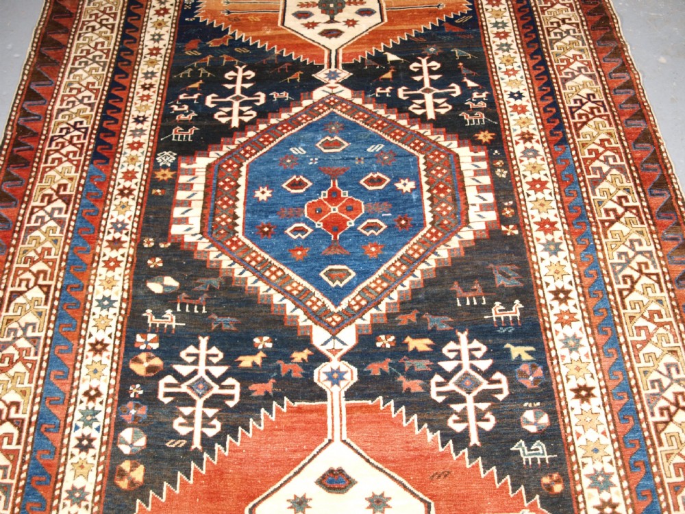 ANTIQUE CAUCASIAN SHIRVAN MEDALLION RUG OF LARGE SIZE, CIRCA 1890. View IV