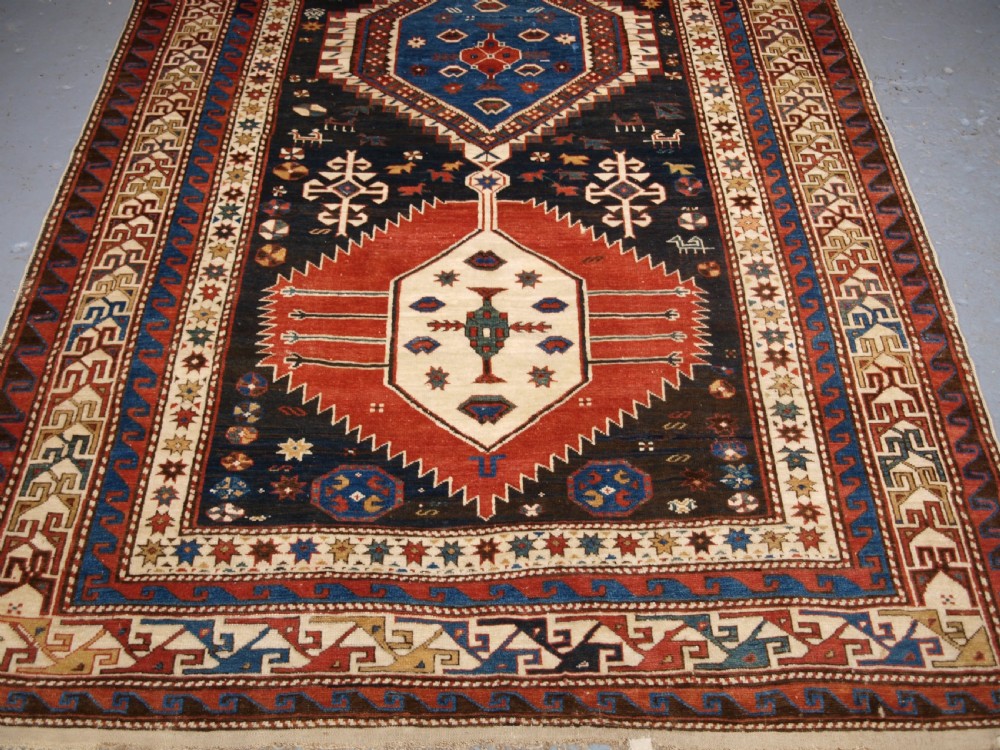 ANTIQUE CAUCASIAN SHIRVAN MEDALLION RUG OF LARGE SIZE, CIRCA 1890. View V