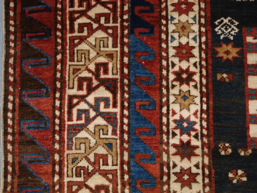 ANTIQUE CAUCASIAN SHIRVAN MEDALLION RUG OF LARGE SIZE, CIRCA 1890. View VII