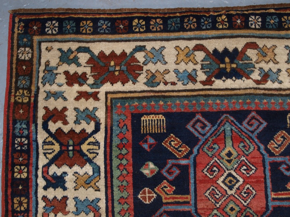 ANTIQUE CAUCASIAN GENDJE KAZAK RUNNER WITH MEDALLION DESIGN, CIRCA 1890. View VII