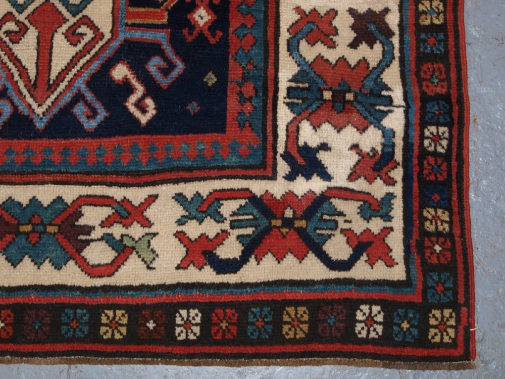 ANTIQUE CAUCASIAN GENDJE KAZAK RUNNER WITH MEDALLION DESIGN, CIRCA 1890. View XIII