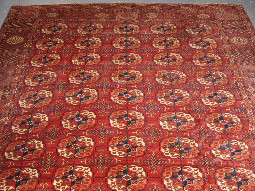 ANTIQUE TEKKE TURKMEN MAIN CARPET, LARGE ROUND GULS, CIRCA 1880. View III