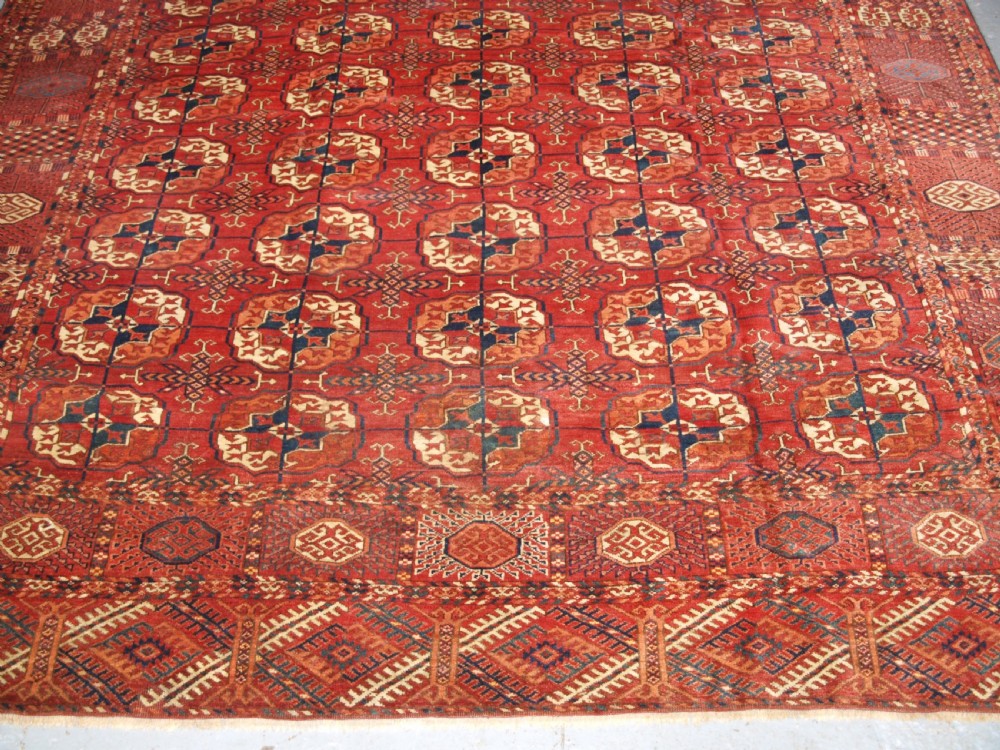 ANTIQUE TEKKE TURKMEN MAIN CARPET, LARGE ROUND GULS, CIRCA 1880. View V