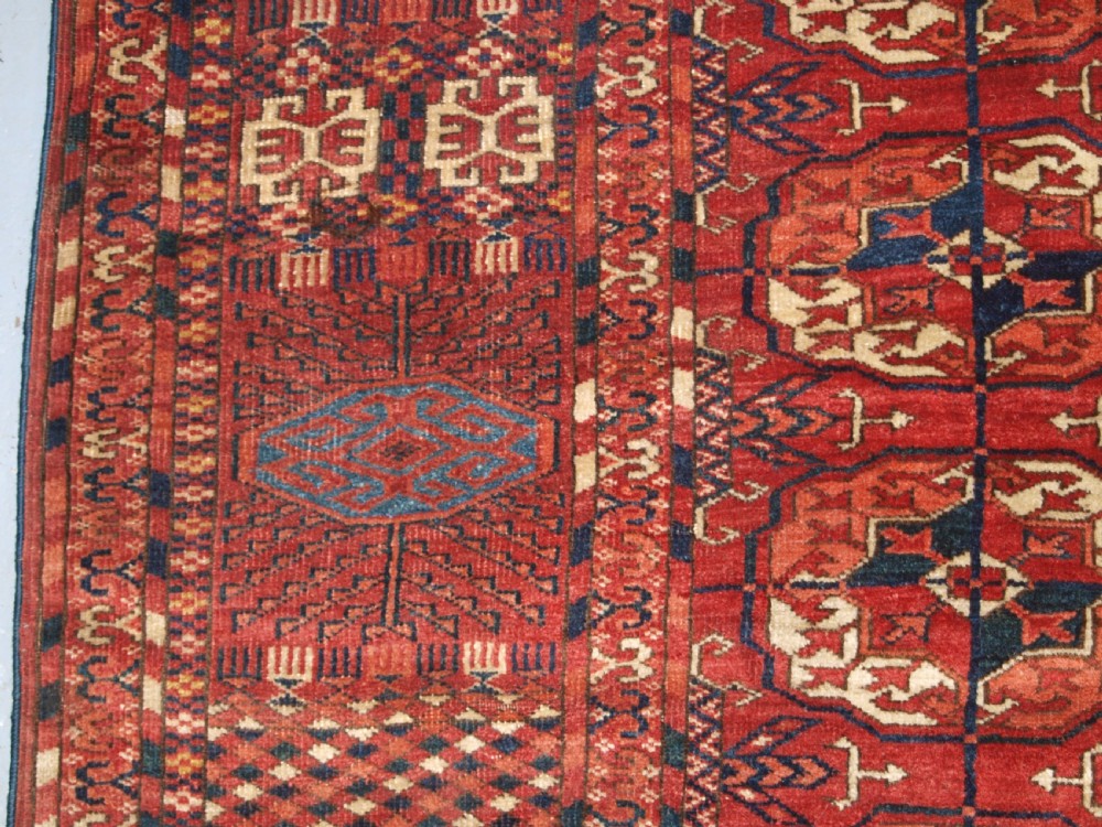 ANTIQUE TEKKE TURKMEN MAIN CARPET, LARGE ROUND GULS, CIRCA 1880. View VII