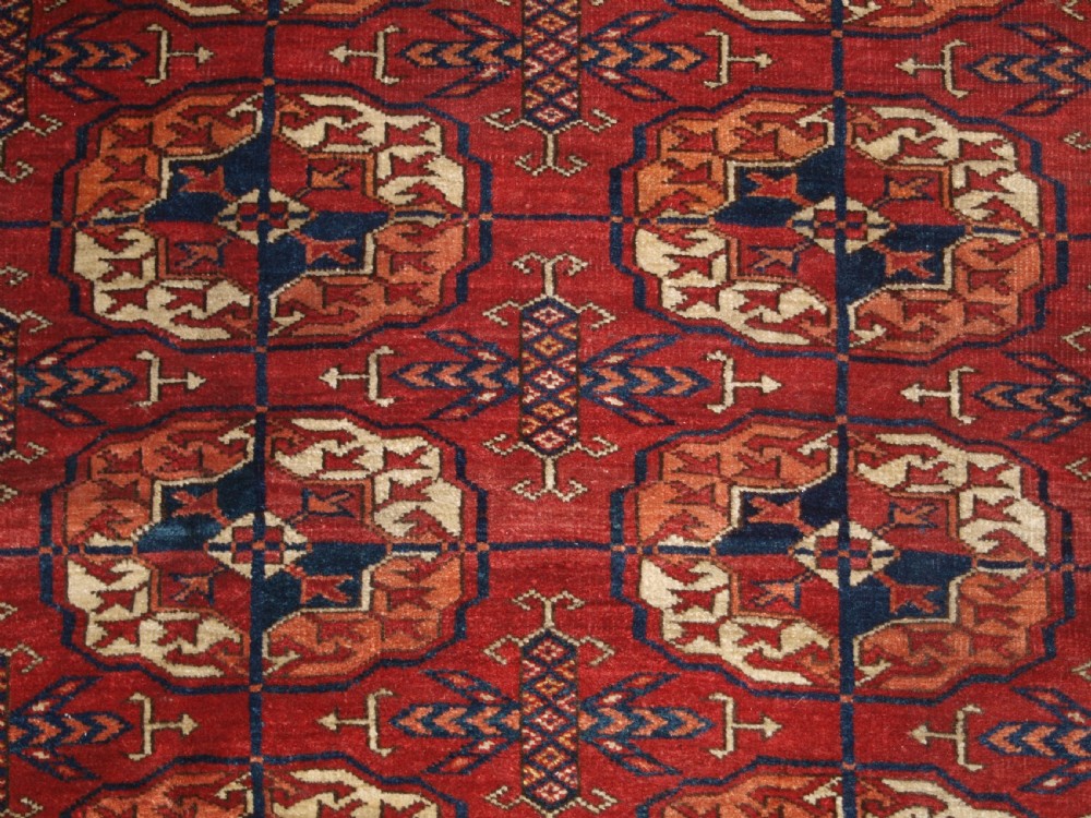ANTIQUE TEKKE TURKMEN MAIN CARPET, LARGE ROUND GULS, CIRCA 1880. View VIII