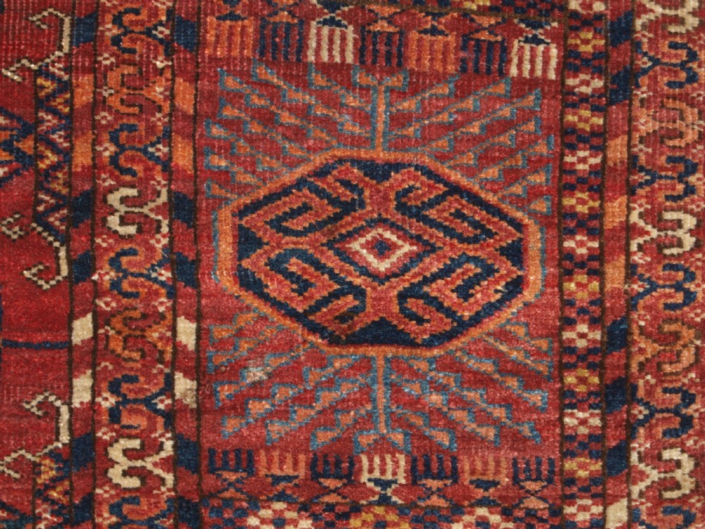 ANTIQUE TEKKE TURKMEN MAIN CARPET, LARGE ROUND GULS, CIRCA 1880. View X