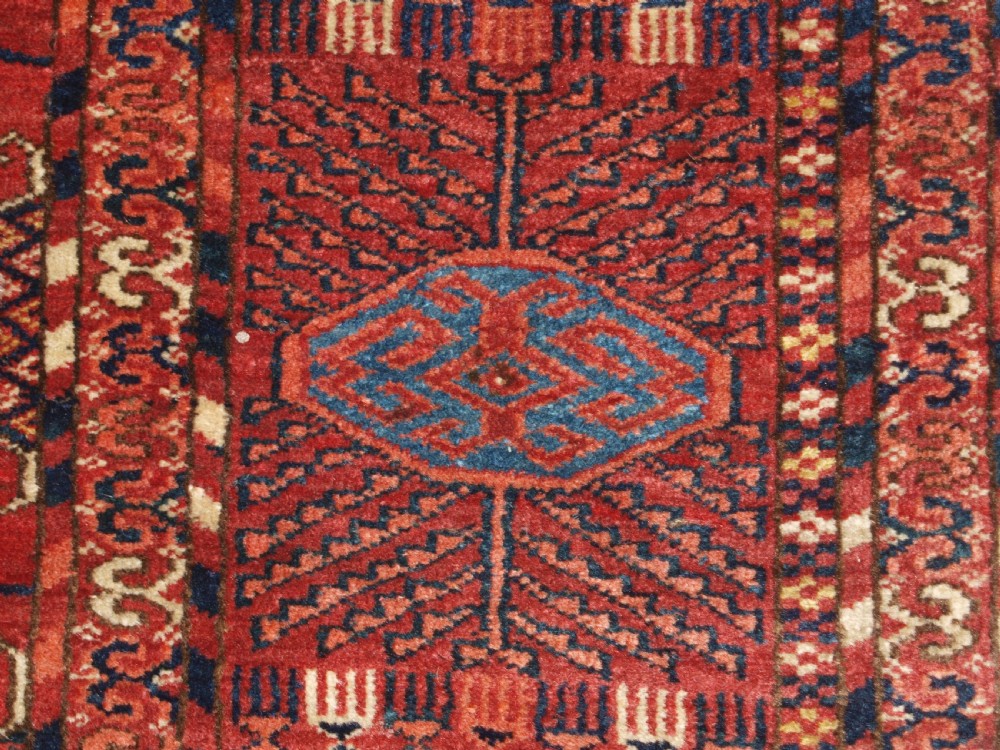 ANTIQUE TEKKE TURKMEN MAIN CARPET, LARGE ROUND GULS, CIRCA 1880. View XI