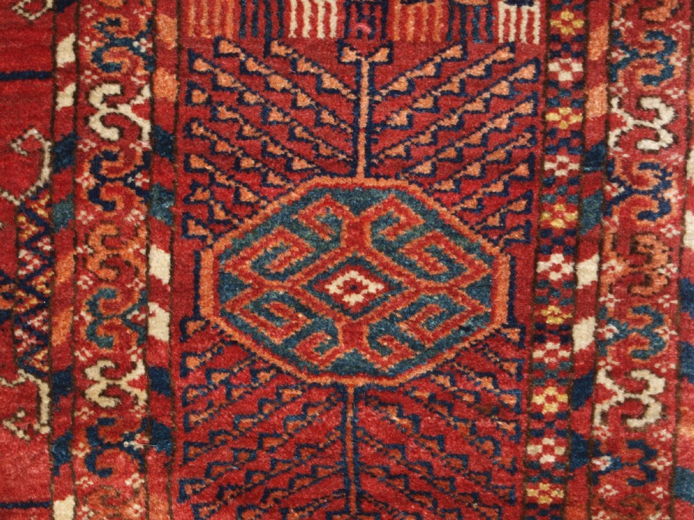 ANTIQUE TEKKE TURKMEN MAIN CARPET, LARGE ROUND GULS, CIRCA 1880. View XII
