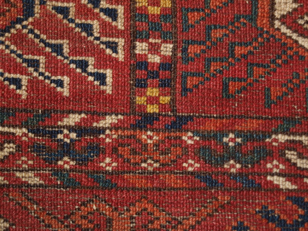 ANTIQUE TEKKE TURKMEN MAIN CARPET, LARGE ROUND GULS, CIRCA 1880. View XIV