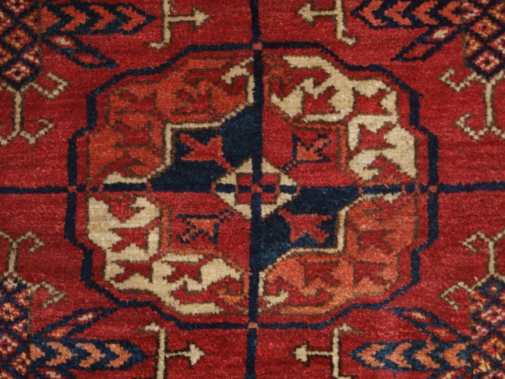 ANTIQUE TEKKE TURKMEN MAIN CARPET, LARGE ROUND GULS, CIRCA 1880. View XV