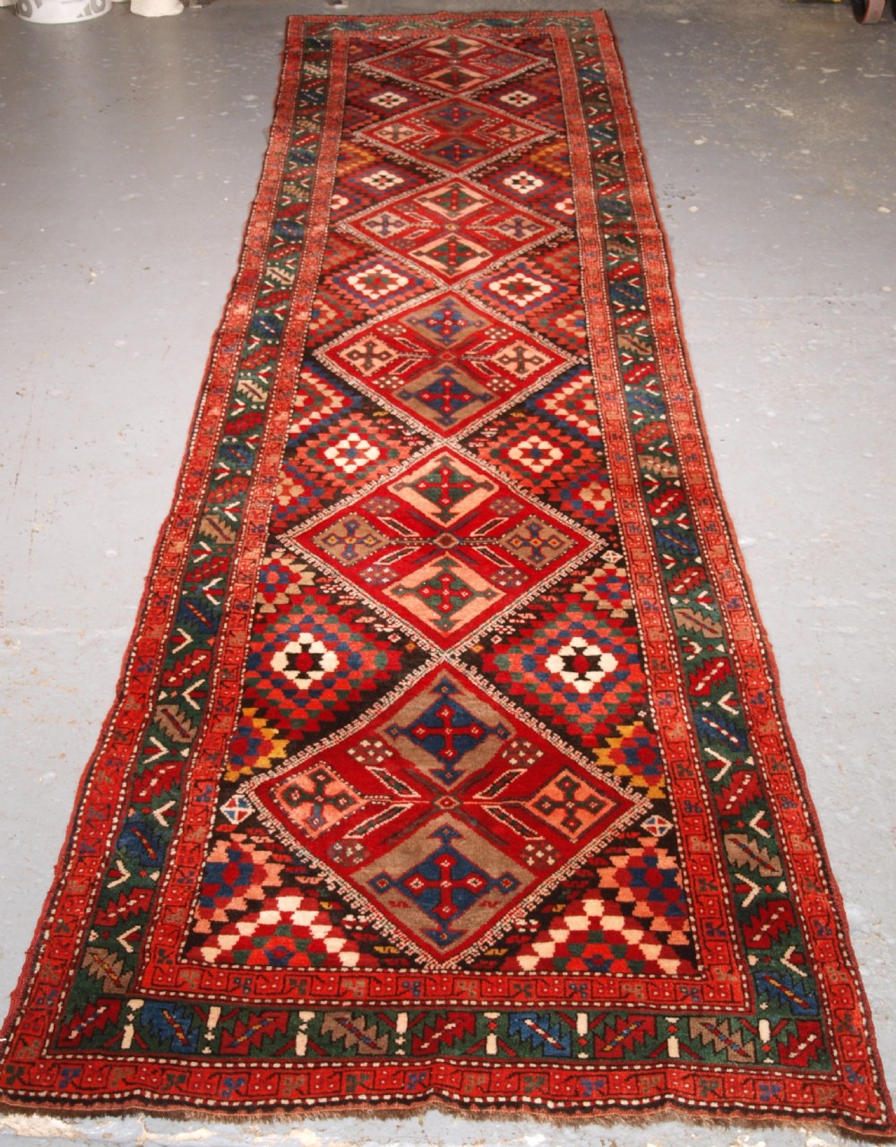 ANTIQUE SOUTH CAUCASIAN OR KURDISH RUNNER, EXCELLENT CONDITION, CIRCA 1920.