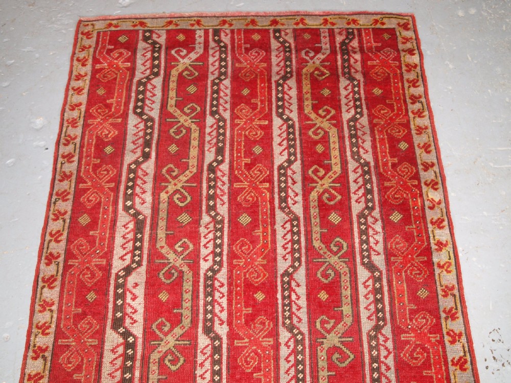ANTIQUE TURKISH KIRSEHIR VILLAGE RUNNER WITH TRADITIONAL VINE DESIGN, CIRCA 1900. View III