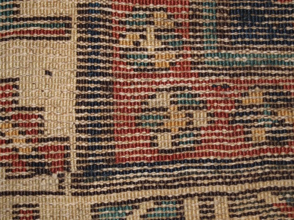 An antique hand-knotted wool Kelardasht runner rug featuring geometric medallions in dark blue, terracotta red, and cream with multi-layered patterned borders. View XV