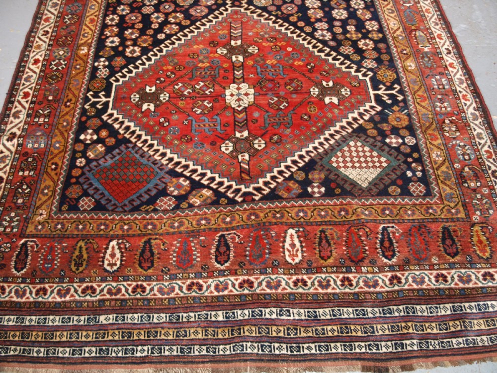 ANTIQUE KELLEH LONG RUG BY THE LURI TRIBE, CLASSIC MEDALLION DESIGN, CIRCA 1900. View V