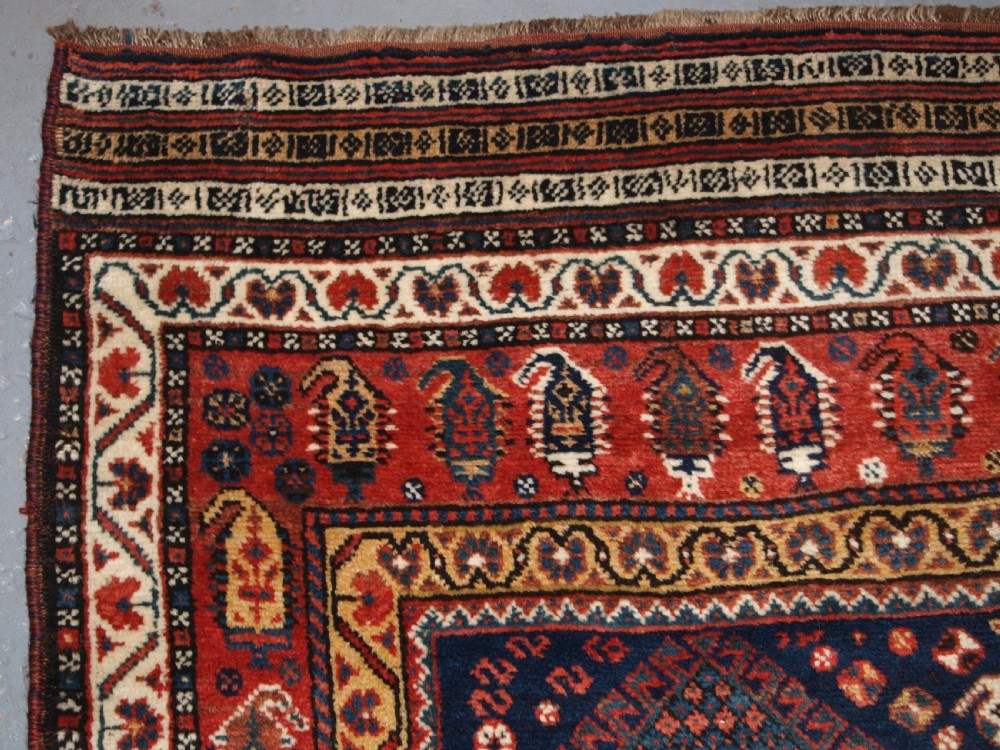 ANTIQUE KELLEH LONG RUG BY THE LURI TRIBE, CLASSIC MEDALLION DESIGN, CIRCA 1900. View VI