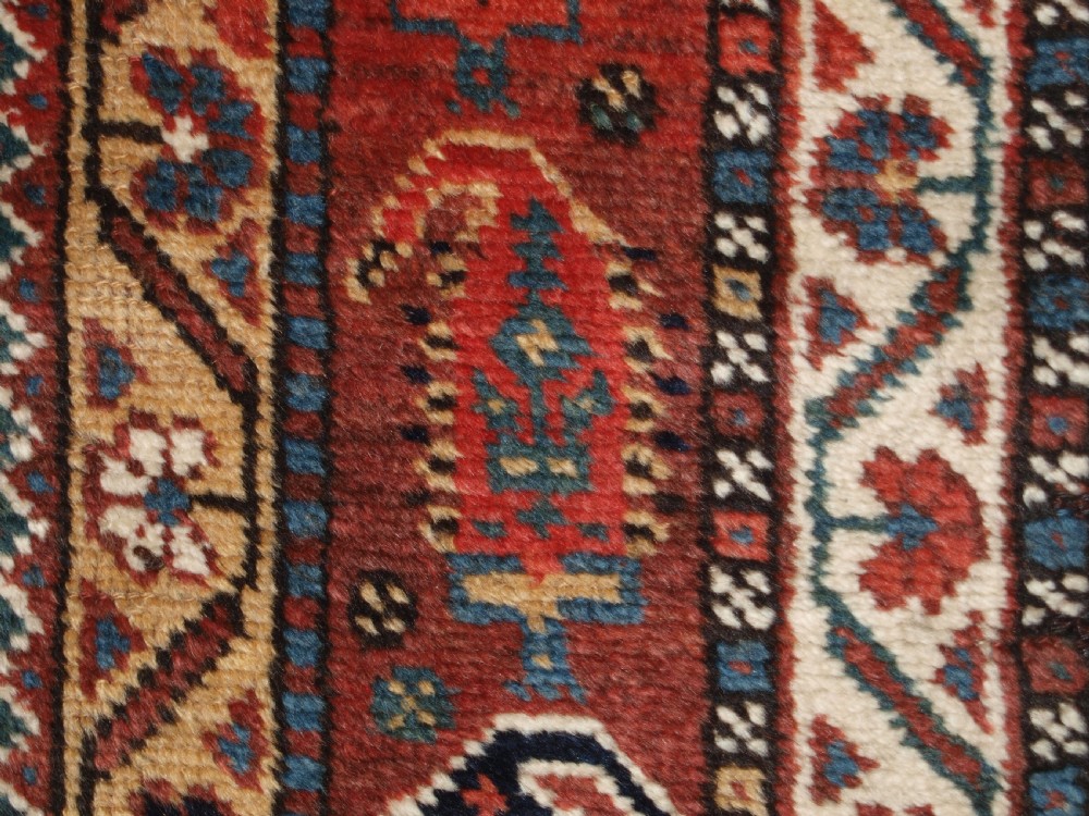 ANTIQUE KELLEH LONG RUG BY THE LURI TRIBE, CLASSIC MEDALLION DESIGN, CIRCA 1900. View XIV