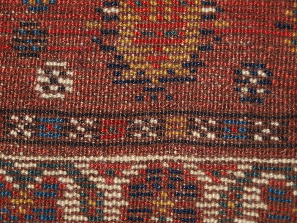 ANTIQUE KELLEH LONG RUG BY THE LURI TRIBE, CLASSIC MEDALLION DESIGN, CIRCA 1900. View XV
