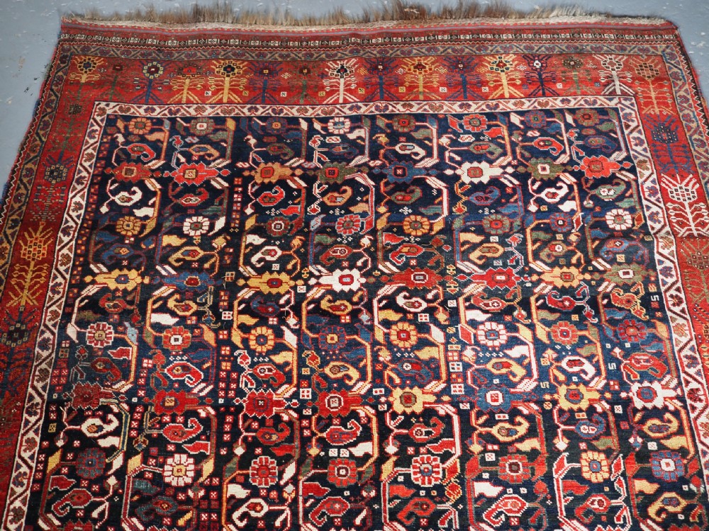 ANTIQUE TRIBAL KHAMSEH RUG WITH OUTSTANDING DESIGN AND COLOUR, CIRCA 1870. View II