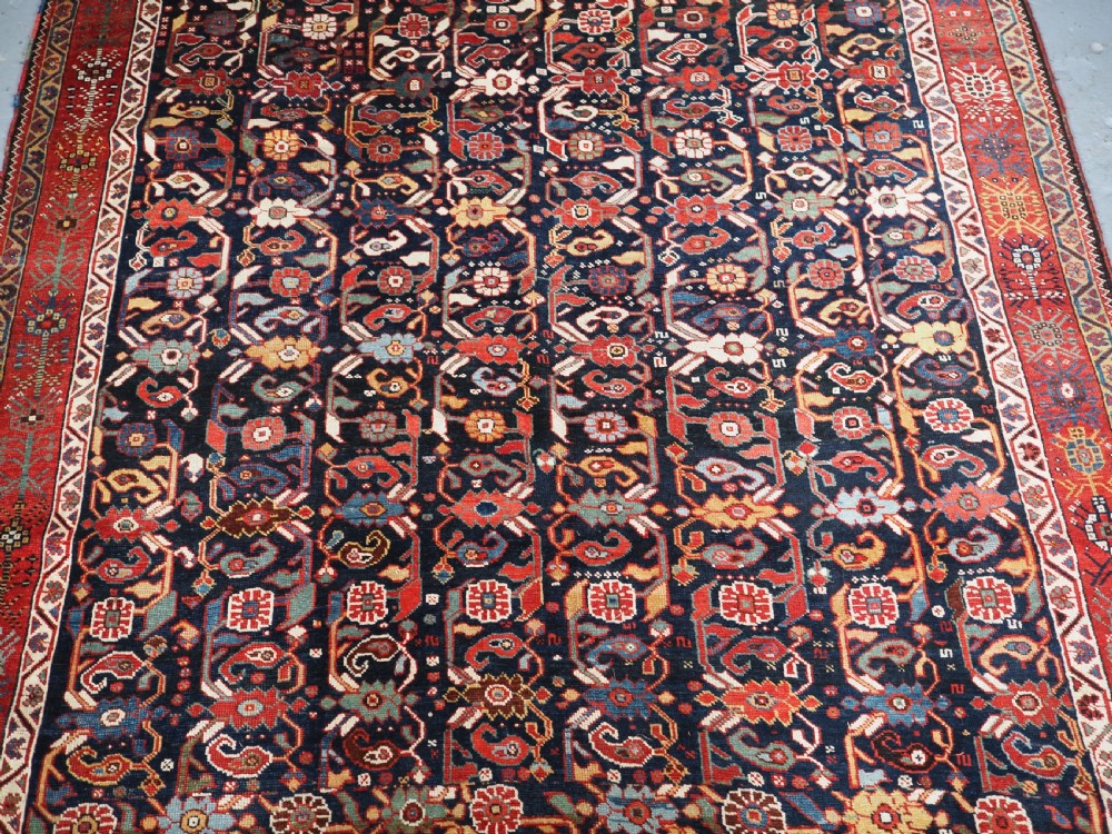 ANTIQUE TRIBAL KHAMSEH RUG WITH OUTSTANDING DESIGN AND COLOUR, CIRCA 1870. View IV