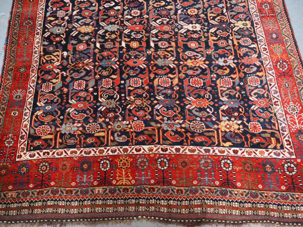 ANTIQUE TRIBAL KHAMSEH RUG WITH OUTSTANDING DESIGN AND COLOUR, CIRCA 1870. View V