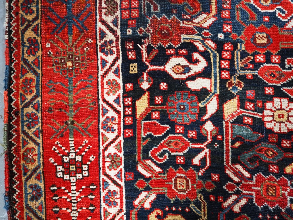 ANTIQUE TRIBAL KHAMSEH RUG WITH OUTSTANDING DESIGN AND COLOUR, CIRCA 1870. View VII