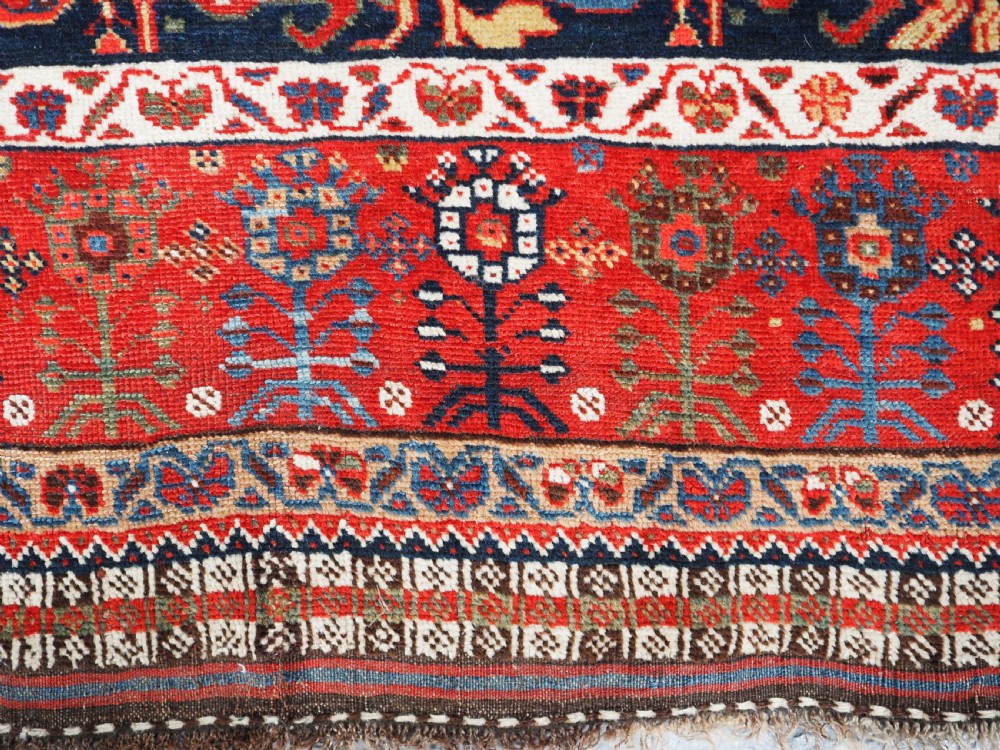 ANTIQUE TRIBAL KHAMSEH RUG WITH OUTSTANDING DESIGN AND COLOUR, CIRCA 1870. View XIII