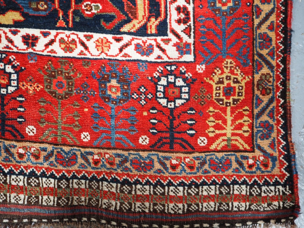 ANTIQUE TRIBAL KHAMSEH RUG WITH OUTSTANDING DESIGN AND COLOUR, CIRCA 1870. View XIV
