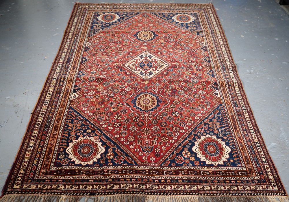 ANTIQUE SILK WEFTED TRIBAL QASHQAI RUG, OUTSTANDING EXAMPLE, CIRCA 1890.