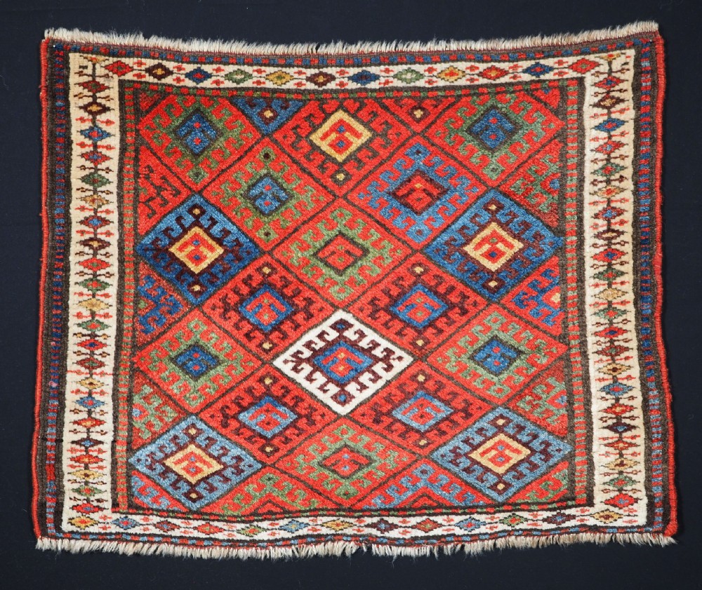 ANTIQUE JAF KURD SADDLE BAG FACE, DIAMOND LATTICE DESIGN, CIRCA 1900.
