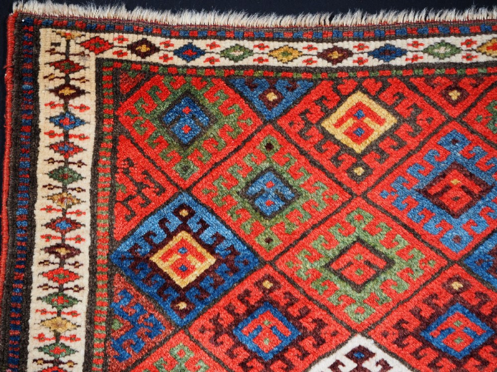 ANTIQUE JAF KURD SADDLE BAG FACE, DIAMOND LATTICE DESIGN, CIRCA 1900. View II