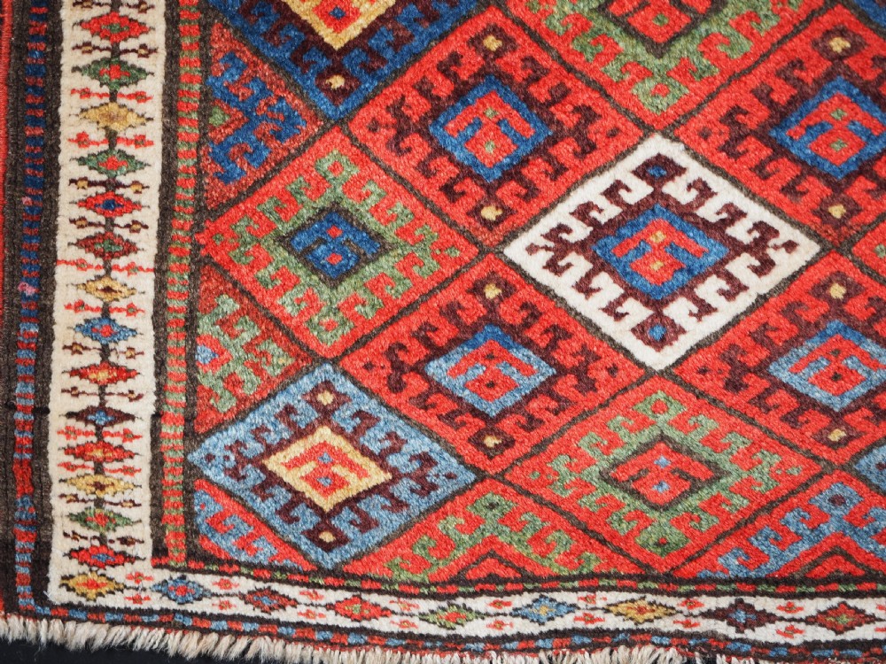 ANTIQUE JAF KURD SADDLE BAG FACE, DIAMOND LATTICE DESIGN, CIRCA 1900. View IV