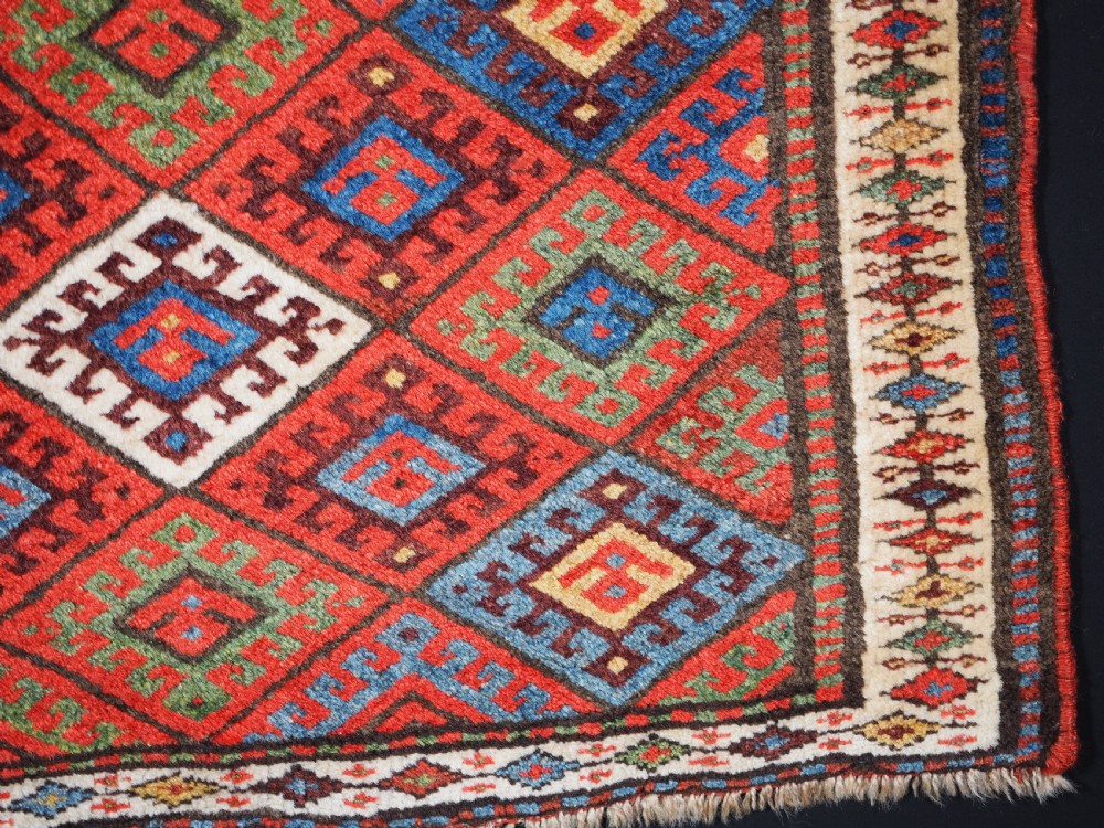 ANTIQUE JAF KURD SADDLE BAG FACE, DIAMOND LATTICE DESIGN, CIRCA 1900. View V