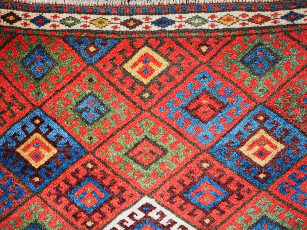 ANTIQUE JAF KURD SADDLE BAG FACE, DIAMOND LATTICE DESIGN, CIRCA 1900. View VI