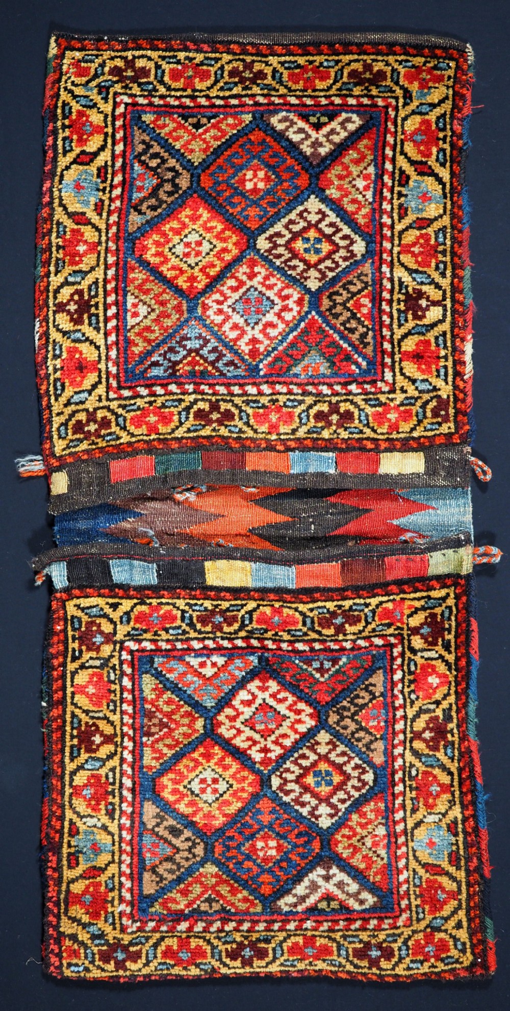 ANTIQUE KURDISH KHORJIN SADDLE BAG, OUTSTANDING ORIGINAL CONDITION, CIRCA 1900.