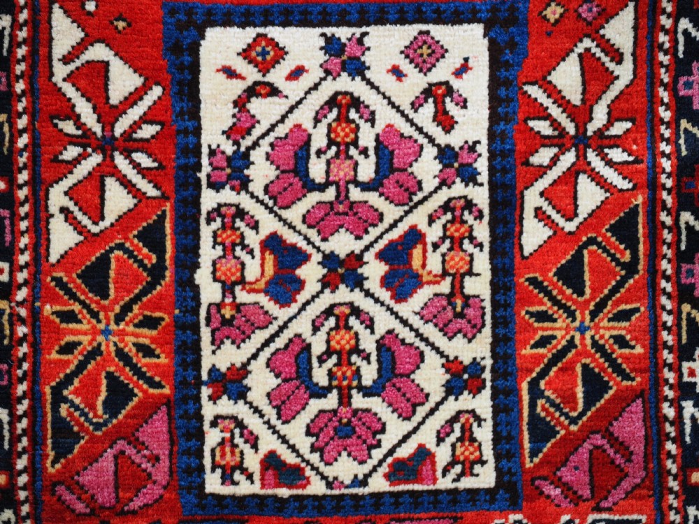 ANTIQUE SOUTH CAUCASIAN BAG WITH STRIPED PLAIN WEAVE BACK, CIRCA 1900. View IV