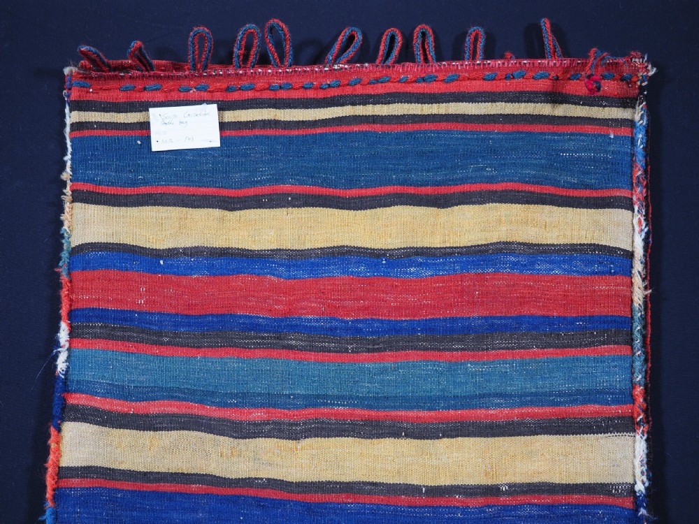 ANTIQUE SOUTH CAUCASIAN BAG WITH STRIPED PLAIN WEAVE BACK, CIRCA 1900. View VII