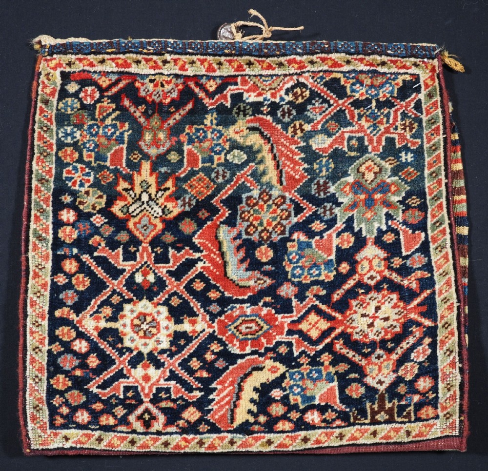 ANTIQUE TRIBAL QASHQAI BAG, HERATI DESIGN WITH STRIPED PLAIN WEAVE BACK, CIRCA 1880. View II