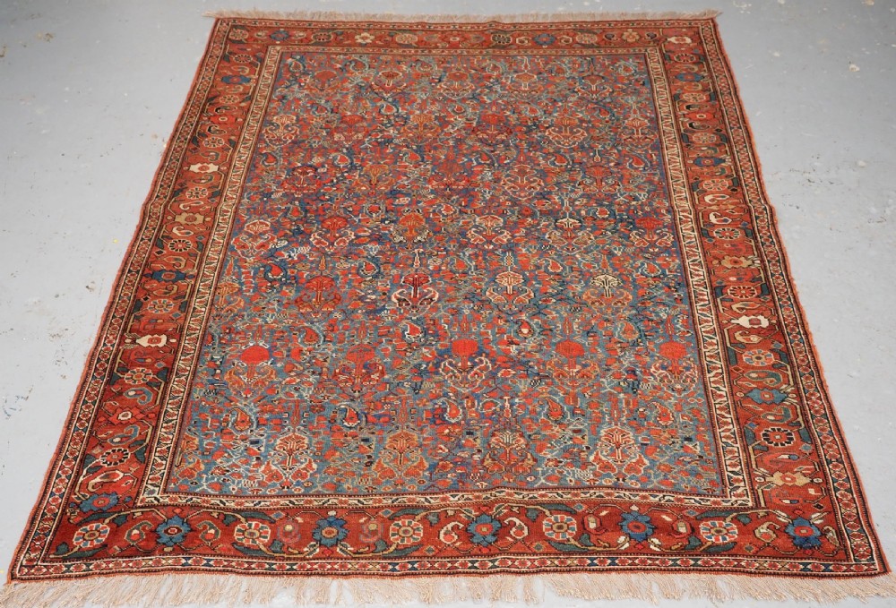 ANTIQUE KHAMSEH TRIBAL RUG, VERY FINE, ALL OVER DESIGN, CIRCA 1900.