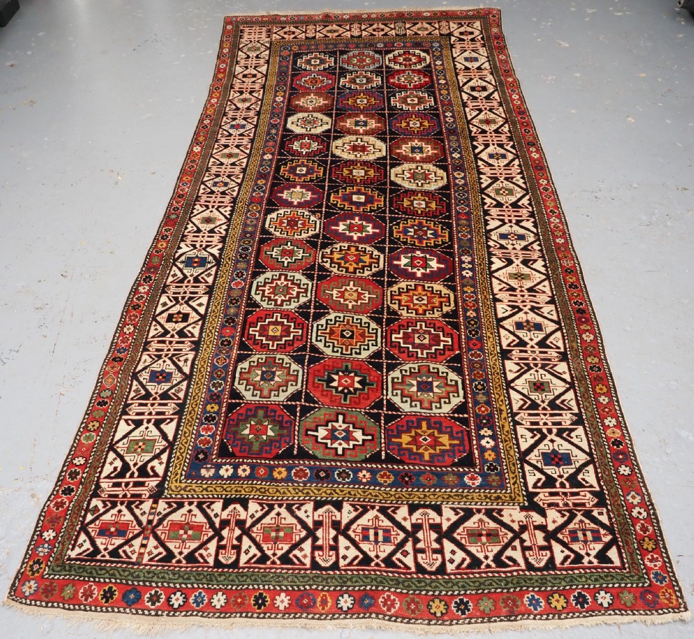 ANTIQUE CAUCASIAN SHIRVAN LONG RUG, DATED 1855, SUPERB COLOUR AND CONDITION.