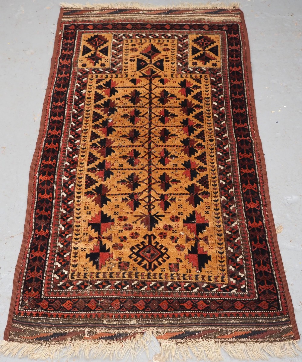 ANTIQUE SARAKH BALUCH PRAYER RUG, CAMEL GROUND TREE OF LIFE, CIRCA 1880.