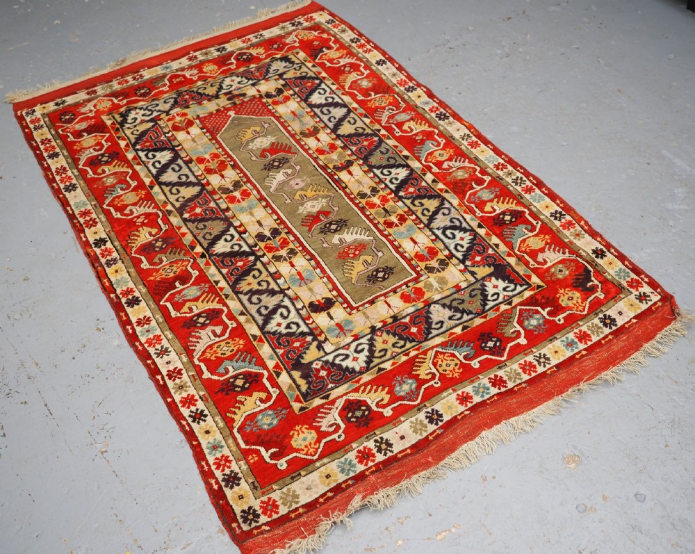 ANTIQUE TURKISH MILAS RUG OF SCARCE DESIGN, SUPERB COLOUR, CIRCA 1890. View II