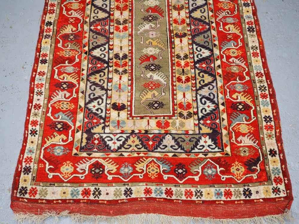ANTIQUE TURKISH MILAS RUG OF SCARCE DESIGN, SUPERB COLOUR, CIRCA 1890. View V