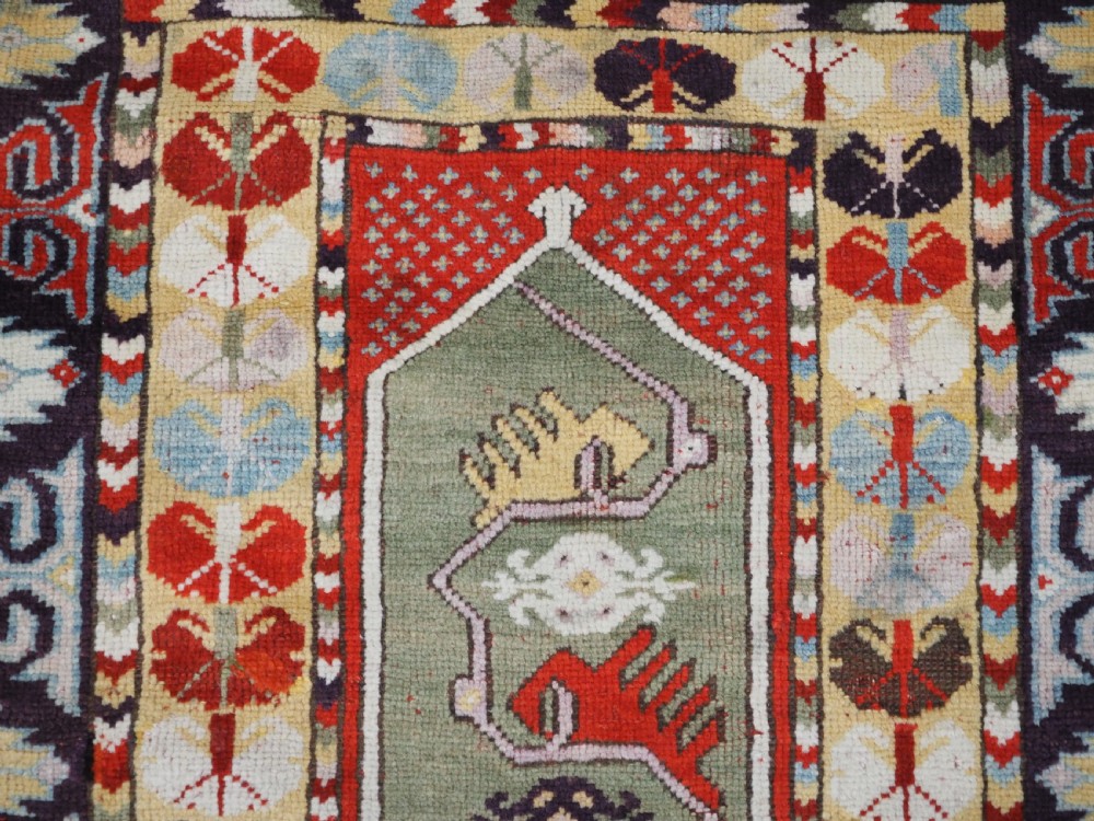 ANTIQUE TURKISH MILAS RUG OF SCARCE DESIGN, SUPERB COLOUR, CIRCA 1890. View VII