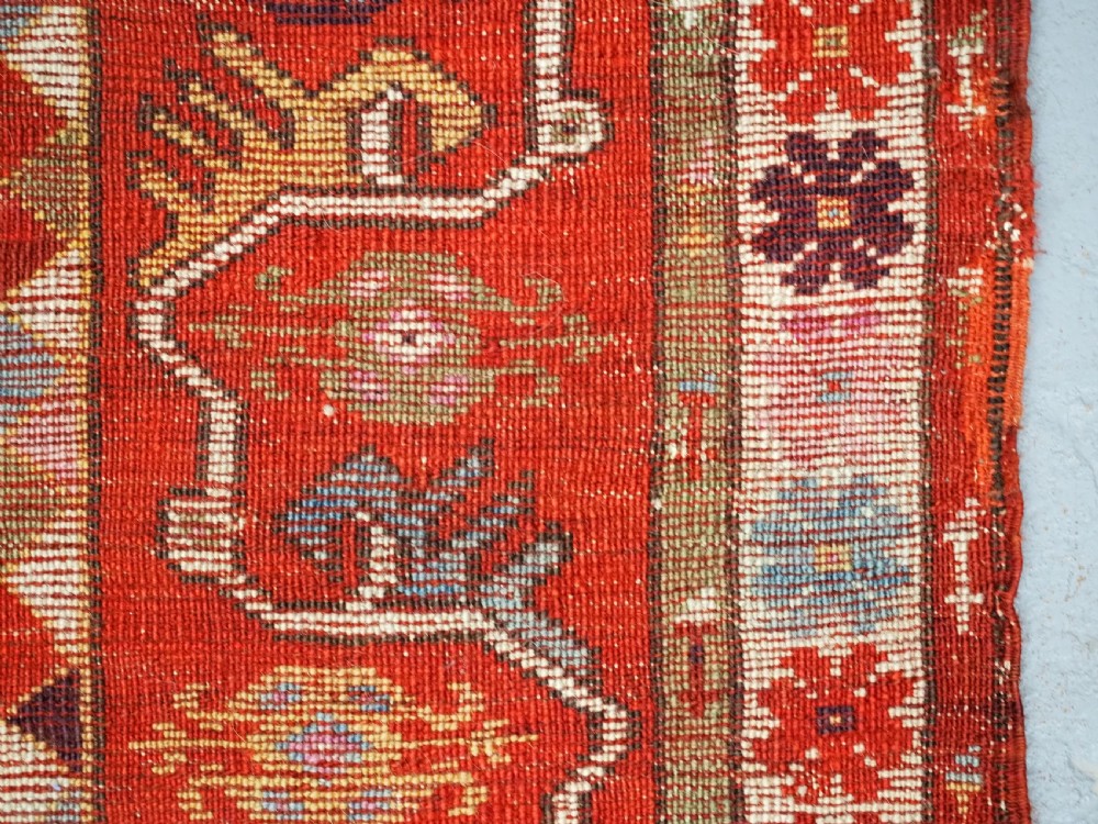 ANTIQUE TURKISH MILAS RUG OF SCARCE DESIGN, SUPERB COLOUR, CIRCA 1890. View IX