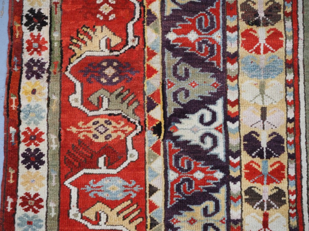 ANTIQUE TURKISH MILAS RUG OF SCARCE DESIGN, SUPERB COLOUR, CIRCA 1890. View X