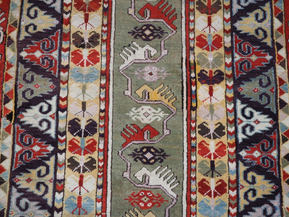 ANTIQUE TURKISH MILAS RUG OF SCARCE DESIGN, SUPERB COLOUR, CIRCA 1890. View XI