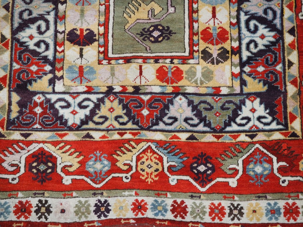 ANTIQUE TURKISH MILAS RUG OF SCARCE DESIGN, SUPERB COLOUR, CIRCA 1890. View XII