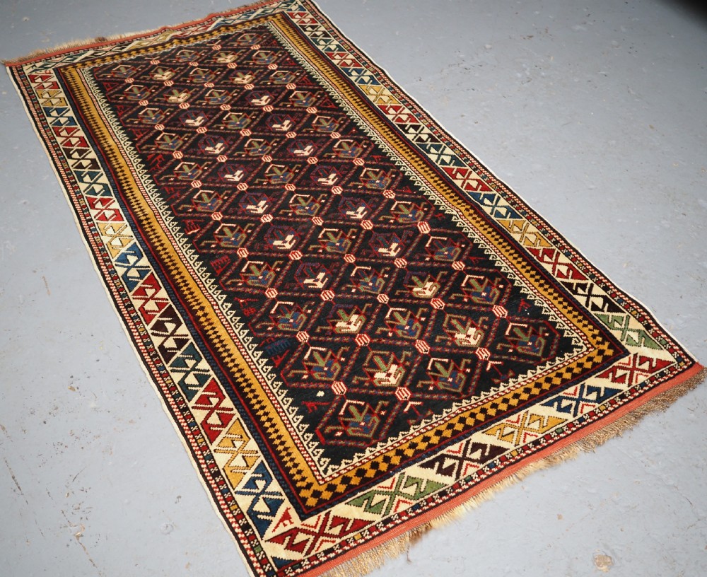 ANTIQUE CAUCASIAN DAGHESTAN RUG, LATTICE DESIGN, OUTSTANDING CONDITION, CIRCA 1900. View II