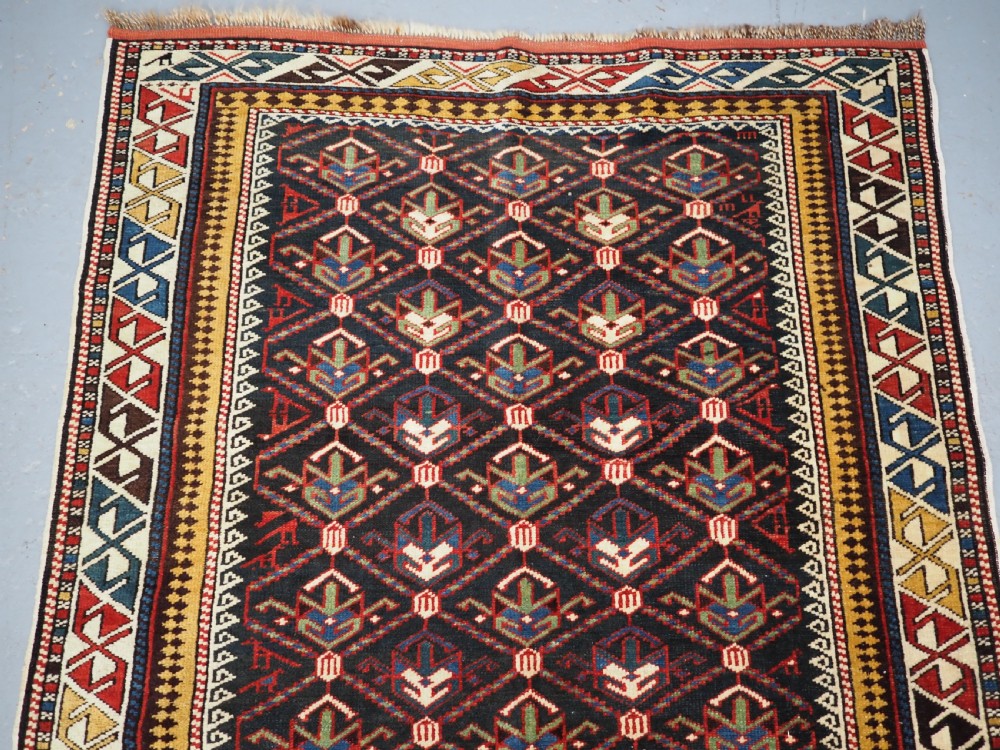 ANTIQUE CAUCASIAN DAGHESTAN RUG, LATTICE DESIGN, OUTSTANDING CONDITION, CIRCA 1900. View III